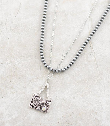Tooled Cow Tag Double Strand Necklace